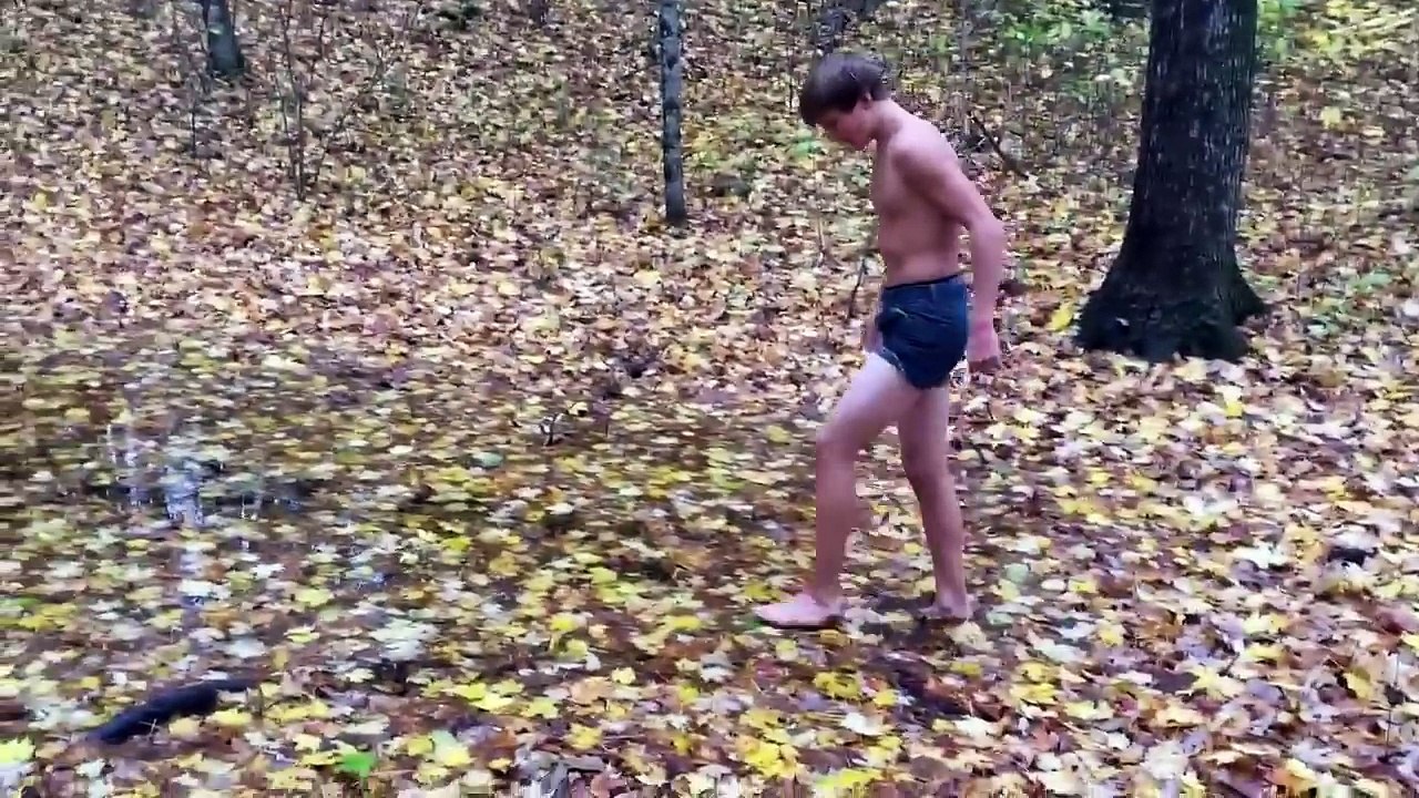 BOYS WRESTLE IN MUD PIT