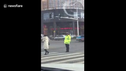 Dancing policeman has unique way of directing traffic
