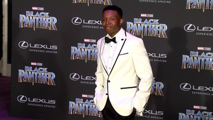 Denzel Whitaker "Black Panther" World Premiere Purple Carpet