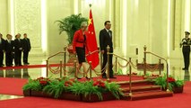 May secures promise of open markets with China