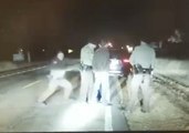 Illinois Deputy Pushes Fellow Officers, Civilian Out of Way of Speeding Car