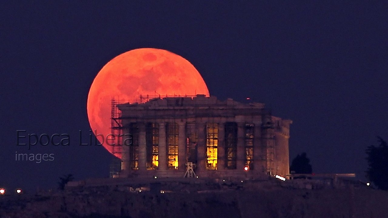 Super blue blood moon rises behind the Acropolis of Athens