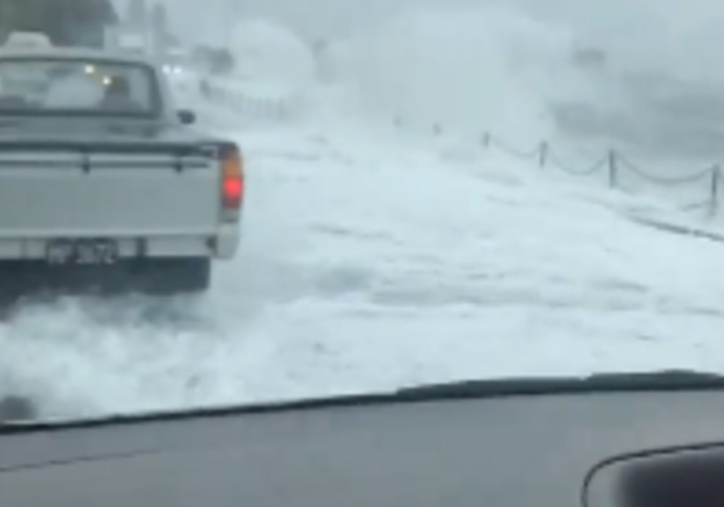 Cars Drive Through Crashing Waves as Cyclone Fehi Lashes Nelson