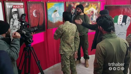 Azez'de, ÖSO birliklerinin resimlerinden oluşan sergi açıldı