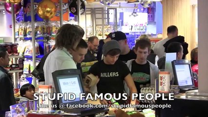 One Direction shoot paparazzi with nerf guns in Times Square