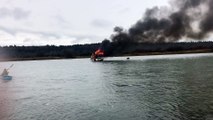 Kayak Rescues Fisherman from Burning Boat