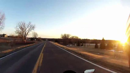 Motorcyclist Almost Crashes into Truck Driving on Wrong Side