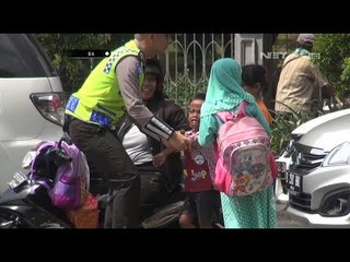 Bripka Agus Menyelamatkan Seorang Anak yang Jatuh dari Motor