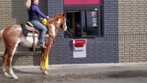 Girl Rides Horse Through Fast Food Drive-Thru