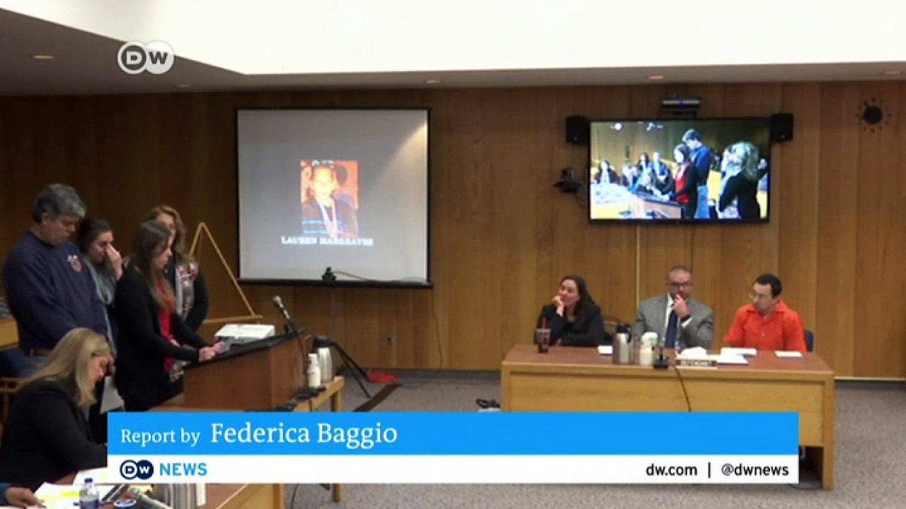 Victims' father lunges at sex abuse doctor Nassar | DW English