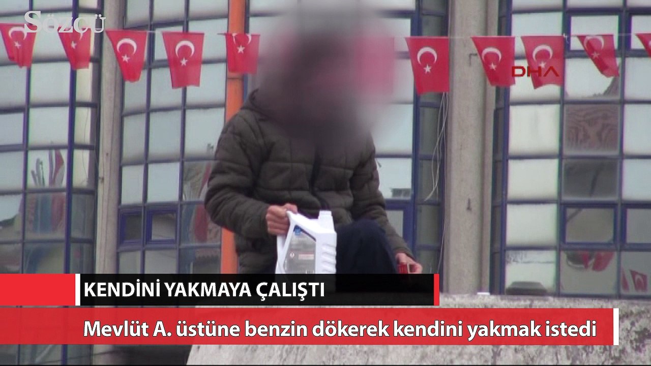 Benzin bidonuyla geldiği kent meydanında kendini yakmaya kalktı