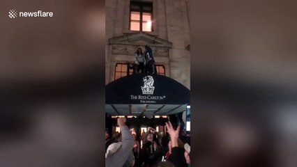 Celebrating Philadelphia fans jump off Ritz-Carlton Hotel canopy