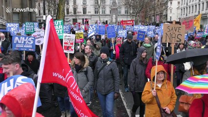 Trump says NHS 'is going broke and not working' as thousands march in London