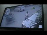 Car thief climb car on the owner