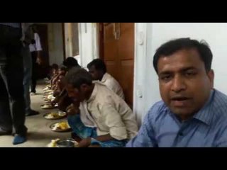 DM Sanjay kumar agrawal giving food to flood victims