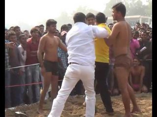 wrestler pushed down mla on the ground in  patna