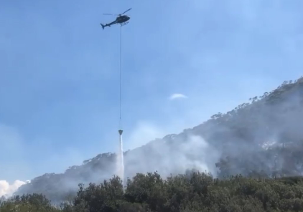 Helicopter Uses Water Bucket to Douse Mount Tomaree Fire