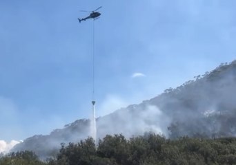 Helicopter Uses Water Bucket to Douse Mount Tomaree Fire