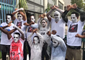 African Asylum Seekers Paint Themselves White to Protest Deportations from Israel