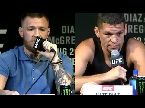 Conor Mcgregor and Nate Diaz throw water bottles at eachother at UFC 202 Press conference