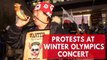 Protesters demonstrate outside North Korean orchestra performance at Winter Olympic Games in Pyeongchang