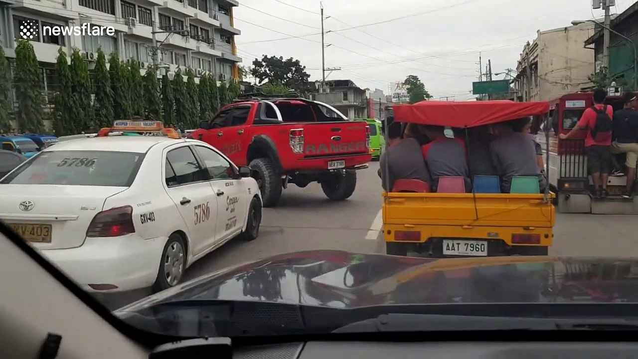 Monster truck driver’s u-turn fail causes traffic jam