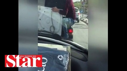 Otomobilin bagajında çamaşır makinesiyle akıl almaz yolculuk