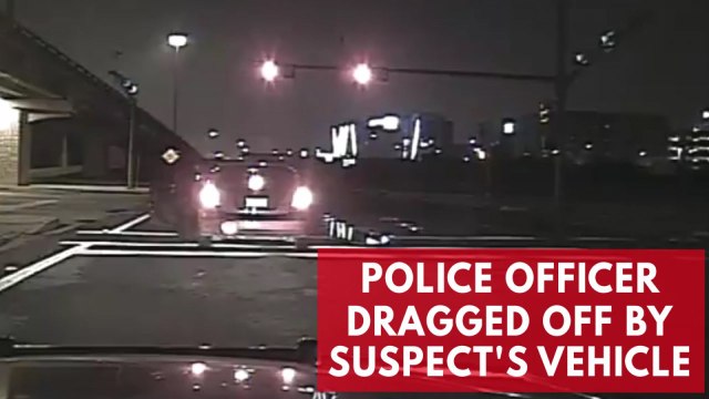 Intoxicated driver speeds away, drags police officer with him