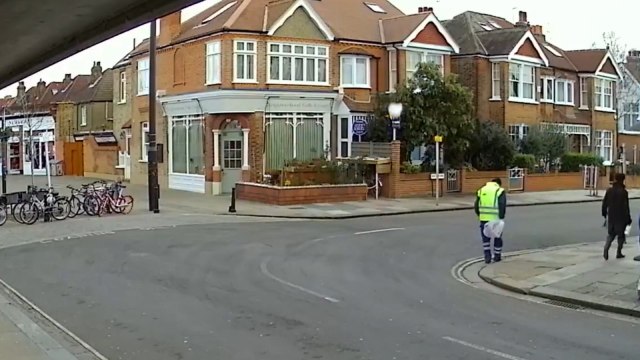 Ice block falls from the sky and narrowly misses passers-by