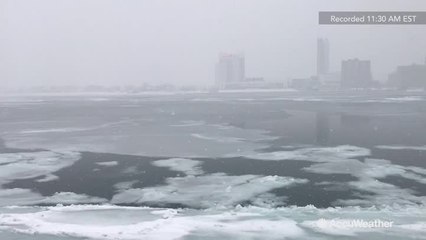 Ice chunks floating down Detroit River