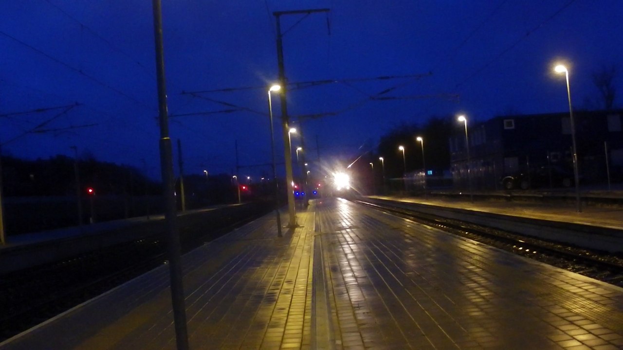 An electric locomotive attached at train