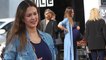 Any day now! Pregnant Jessica Alba showcases bump in clingy navy dress for family outing... after revealing she sees a therapist