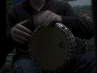 Derbouka  chauffée au kanoun ou à l'ampoule