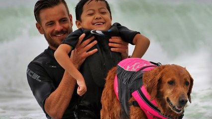 Dog Surfs With Kids Who Need Machines to Breathe