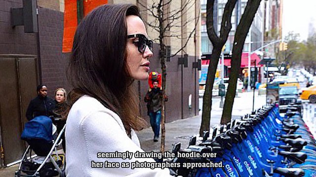 The force is strong with them! Angelina Jolie wears wintry white dress as she takes her children to watch Star Wars: The Last Jedi in snowy New York City