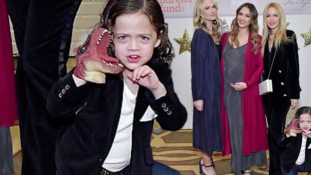 Photobomber! Rachel Zoe's son Kai expertly upstages his fashionista mom as she poses with Jessica Alba and Molly Sims
