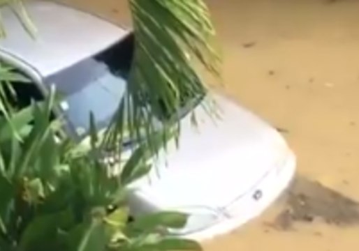 Car Flooded in Surigao City Following Tropical Storm Sanba