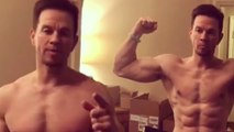 Muscle madness! Mark Wahlberg, 46, shows off chiseled six-pack abs in shirtless video after saying he has 'more desire now' to stay fit.