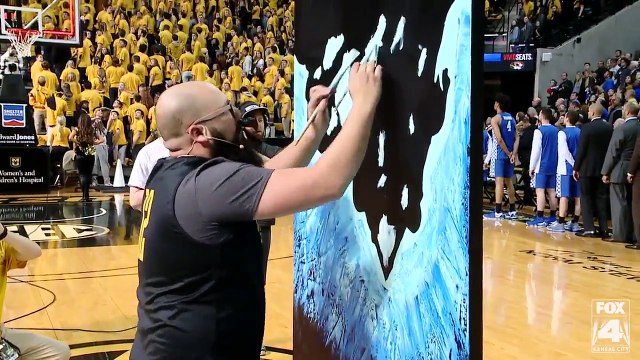 Painter Stuns College Basketball Crowd with Unique National Anthem Performance