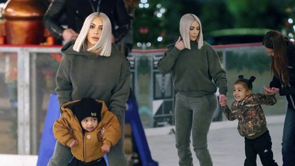 Let it snow! Kim Kardashian helps son Saint ice skate as she hits the rink with daughter North and Kourtney Kardashian during Christmas bash.