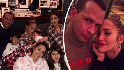 Pyjama-clad Jennifer Lopez cosies up to beau Alex Rodriguez as they celebrate their first Christmas together alongside her nine-year-old twins... following proposal rumours.