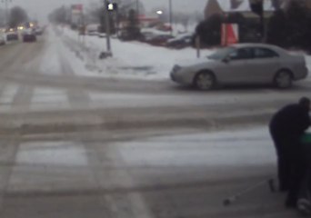 Download Video: Milwaukee Bus Driver Helps Woman With Crutches Who Fell on Icy Street