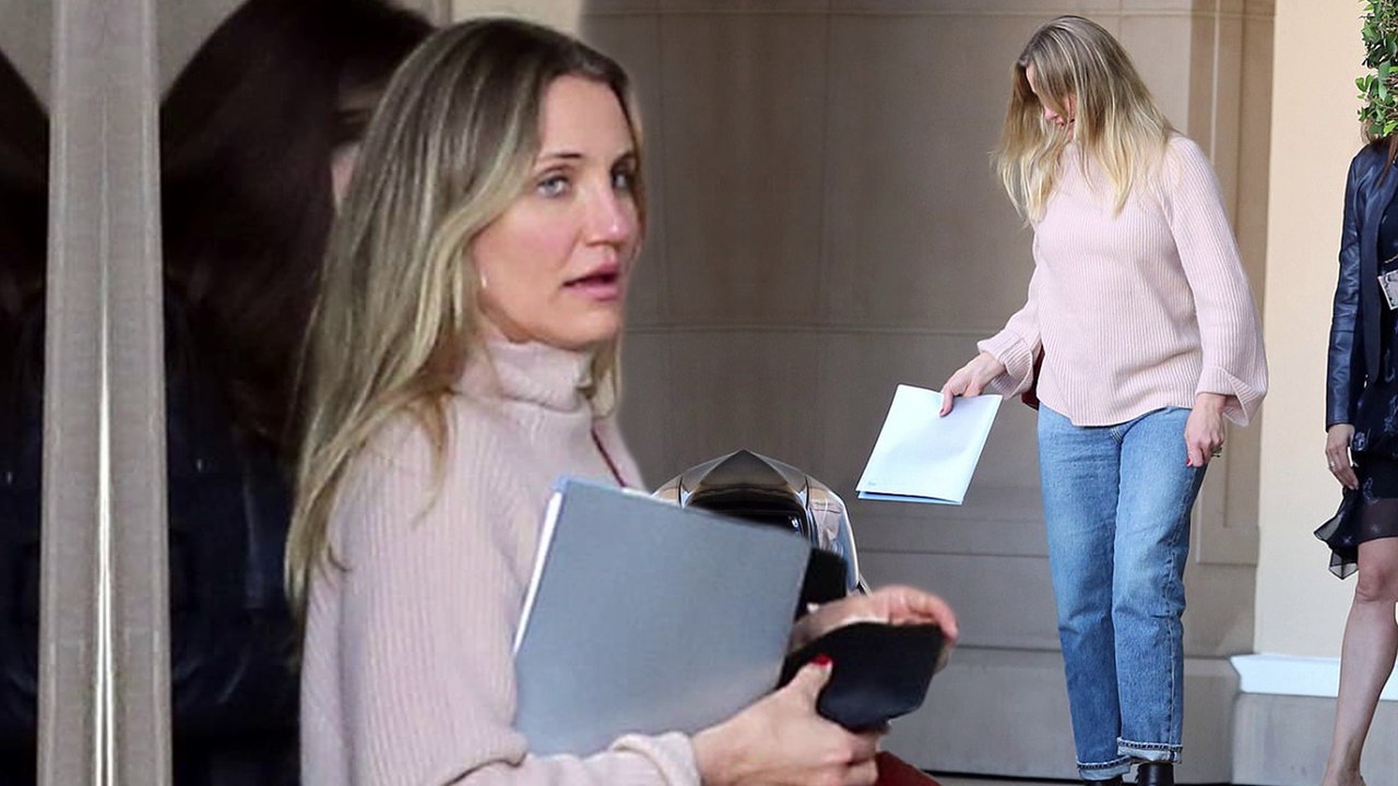 Good jeans! Cameron Diaz cuts a casual figure in baggy denim with peach colored knit while leaving Beverly Hills hotel.