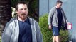 Packing a paunch! Christian Bale appears to have retained the weight he gained for his Backseat role as he picks up a Valentine's Day card.