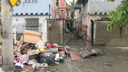 Rio residents struggle to recover after flash floods
