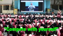 Compete with yourself, Modi tells students