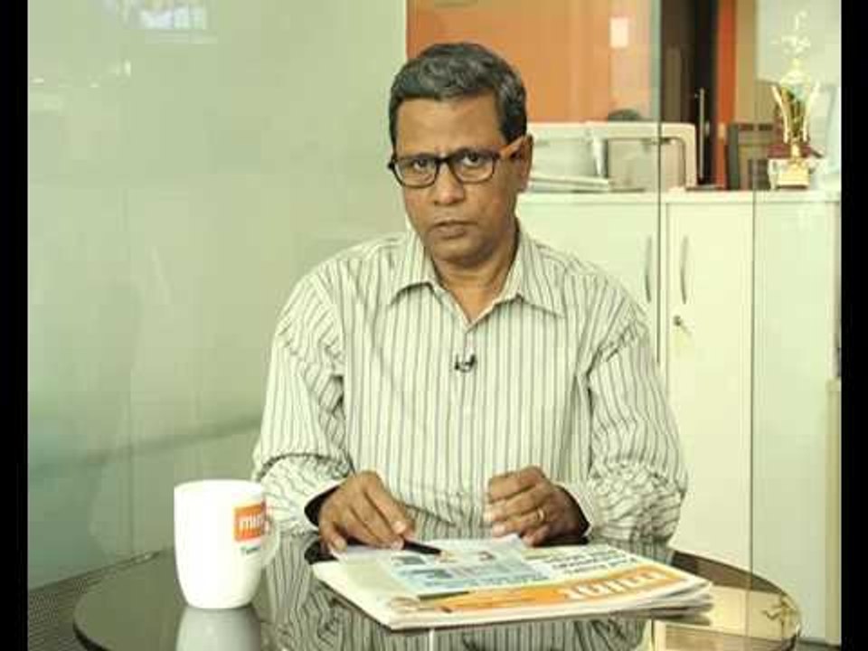 Rupee touches record 65 against dollar