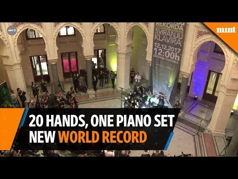 20 Bosnian hands on one piano set new world record