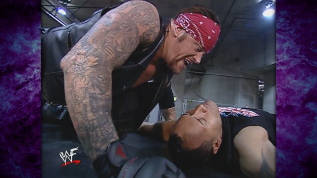 The Undertaker Attacks & Tombstones The Rock on Top of a Limo! 2/7/02