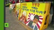 Des manifestants sud-coréens démolissent les portraits de Kim Jong-un